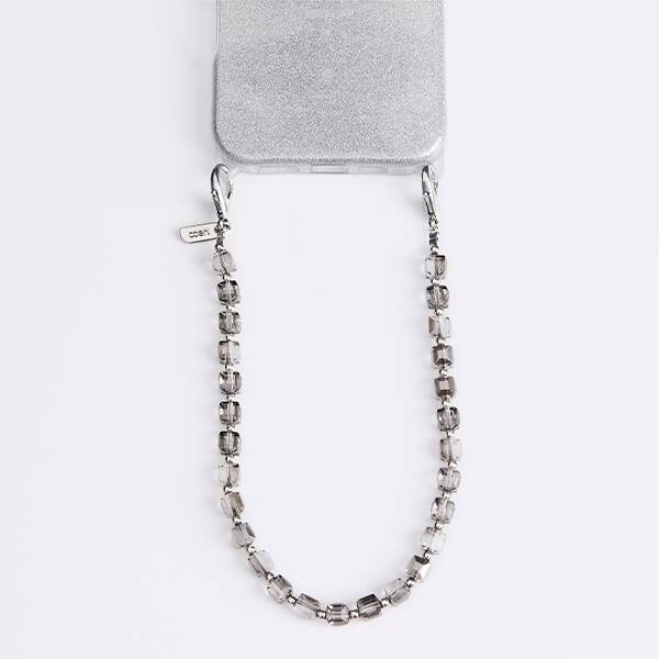 UNIQ Coehl Candy Gem Handstrap            uniwersalny sznurek do telefonu na rękę srebrny/silver sparkling