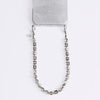 UNIQ Coehl Candy Gem Handstrap            uniwersalny sznurek do telefonu na rękę srebrny/silver sparkling