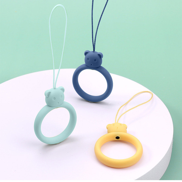 A SILICONE LANYARD FOR A PHONE BEAR RING ON A FINGER ORANGE