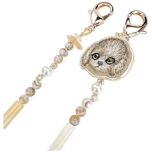 Zawieszka na torebkę handstrap Nimmy     Magnetic fashion brązowy